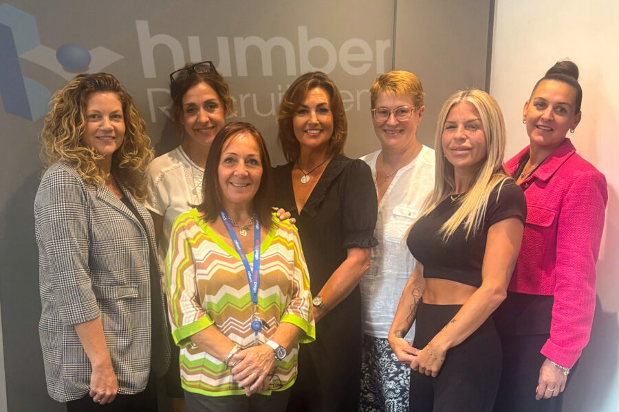 Humber Recruitment team members smiling at the camera after receiving confirmation of REC membership.