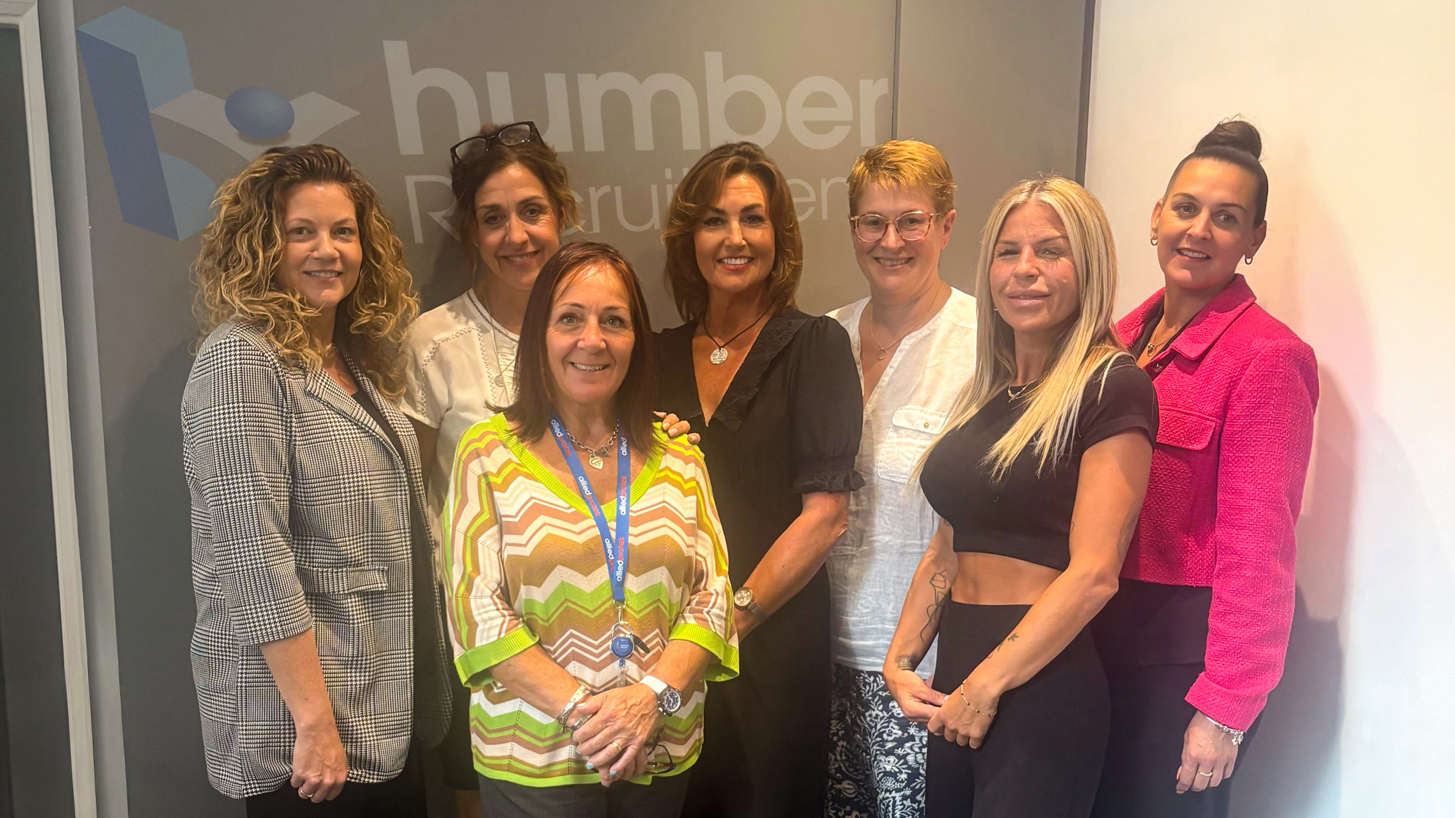 Humber Recruitment team members smiling at the camera after receiving confirmation of REC membership.